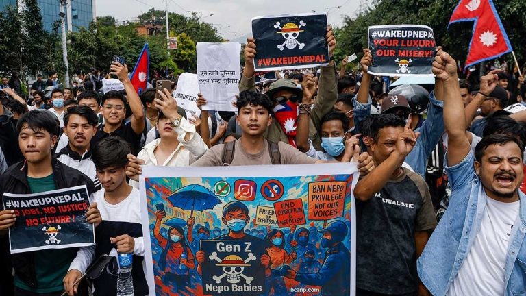 Protesters in Kathmandu march with banners during Gen-Z anti-corruption rally.